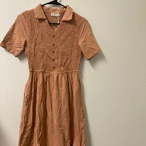 Salmon coloured T-shirt dress.